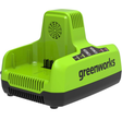 A green Greenworks dual battery charger with a diagnostic LED indicator.